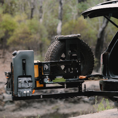 Australian-designed swing-out table for 4WD cooking setups