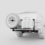 Full modular setup showing spare tyre, jerry cans and rack on 4WD