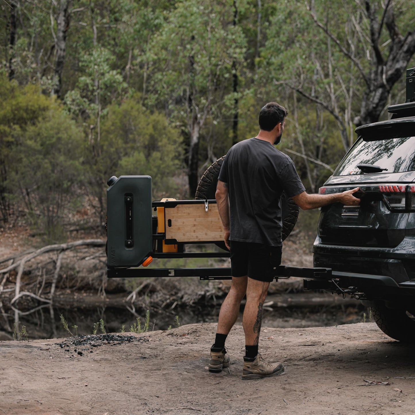 Compact alloy camp table folded out from gear carrier