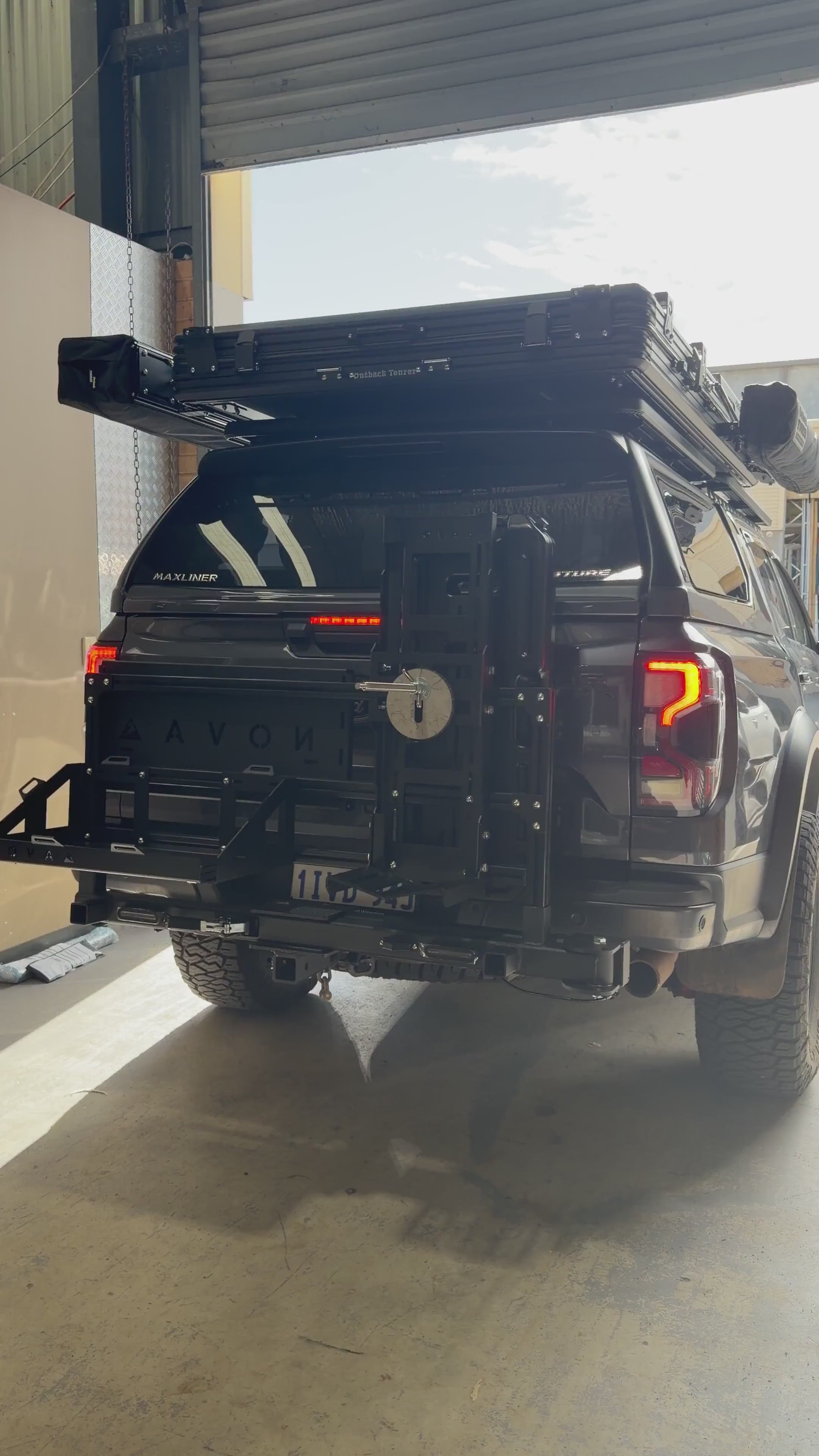 Ford Ranger driving off with the Novaa 4x4 Base Station fitted to the rear hitch.